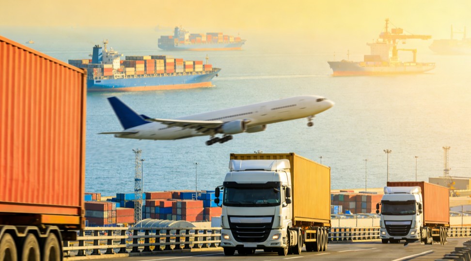 Global logistics hub with ship, airplane and trucks